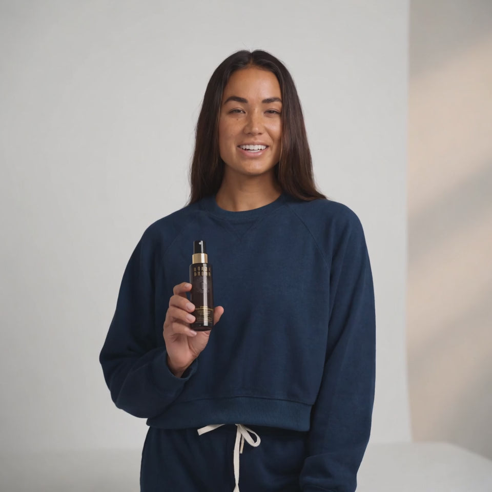 Bobbi Brown Vitamin Enriched Face Base ch a beautiful fine mist so I don't have to wait for it to dry down. It also helps eliminate the dreaded powdery look All in all I really like this Moisturizer 